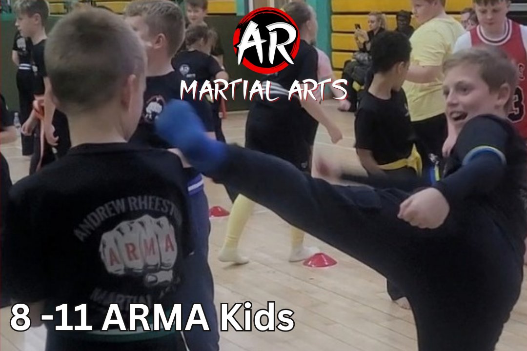 AR Martial Arts children practising controlled kicks in class